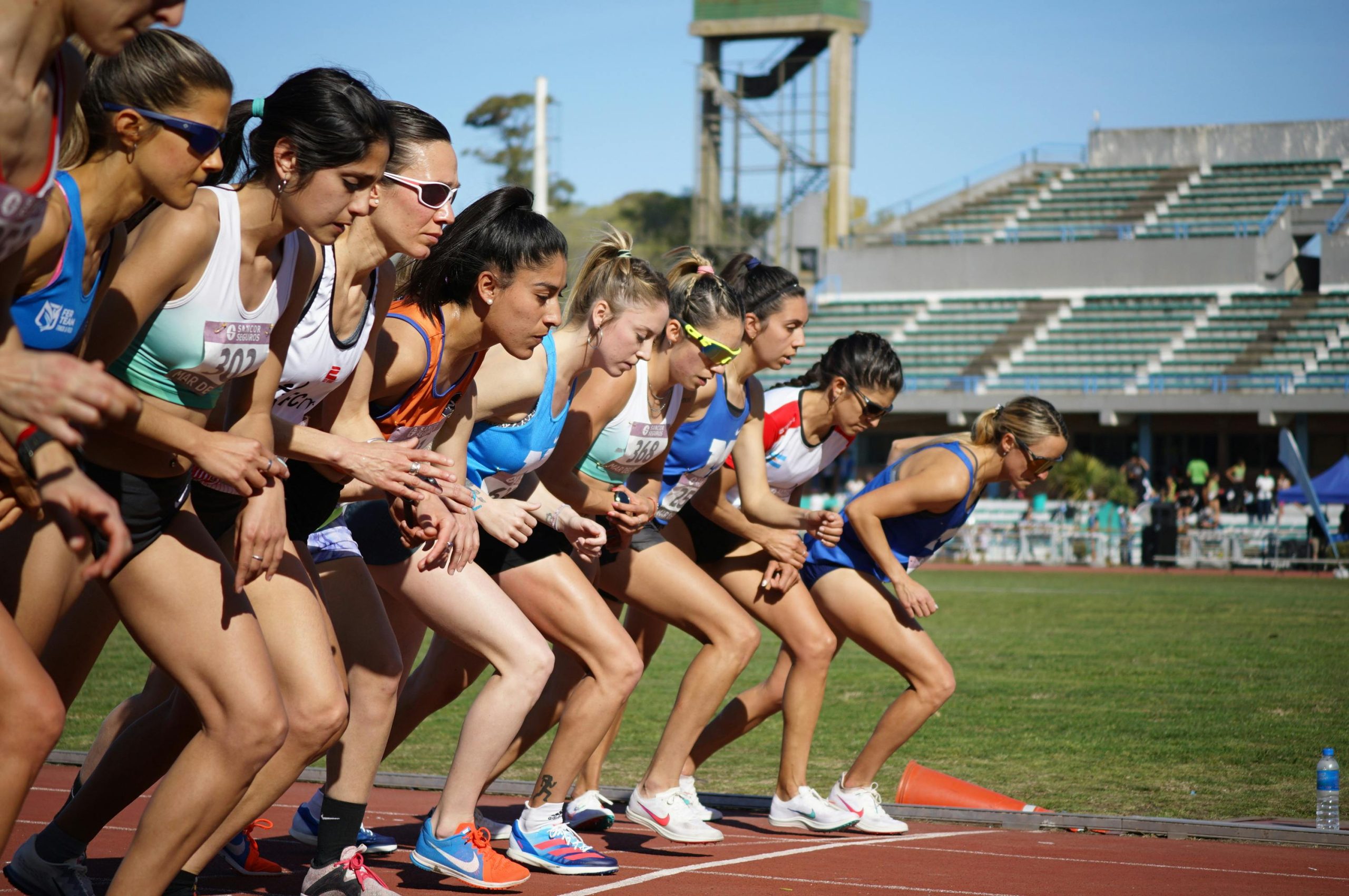 Female athletes at the starting line of a track event in Mar del Plata, Argentina.